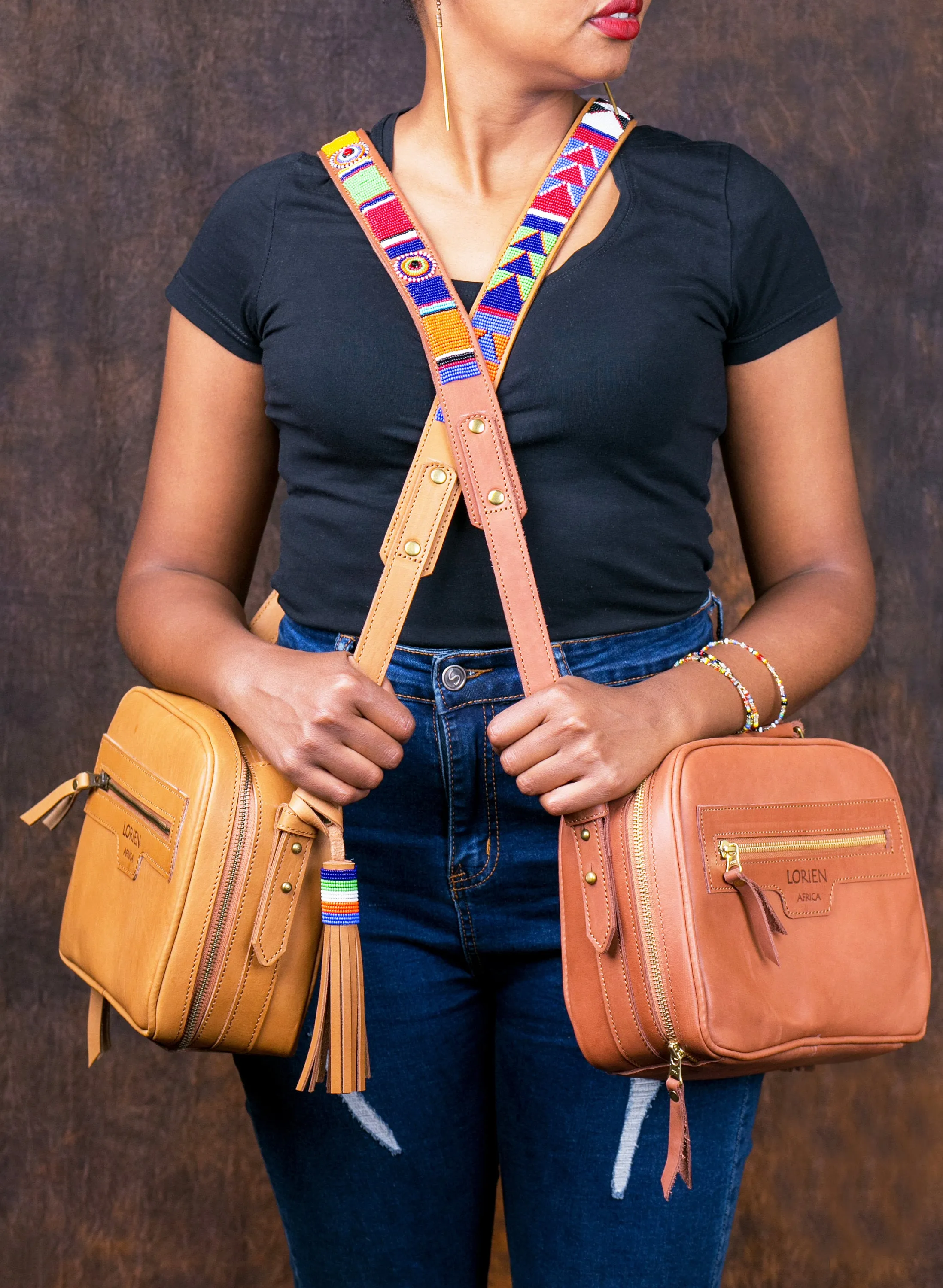 Leather sling bag with beaded strap